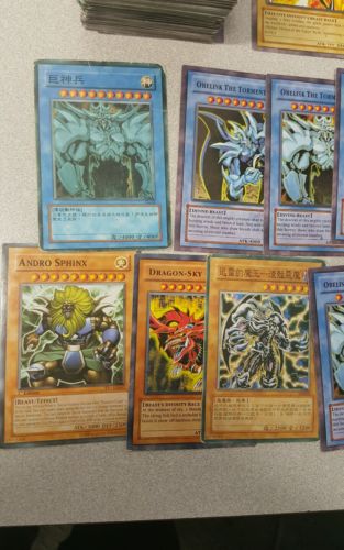 fake-yugioh-cards-lot-of-240-god-cards-japanese-cards-tons-of-random-cards-7d2829d25222c64794d9b7d27de4a392.jpg