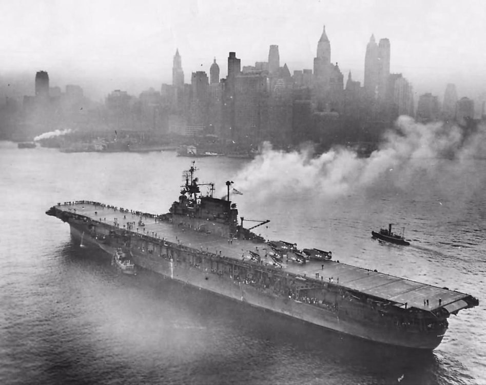Aircraft_carrier_USS_Enterprise_CV-6_Passing_Downtown_New_York_City_on_Hudson_River.jpg