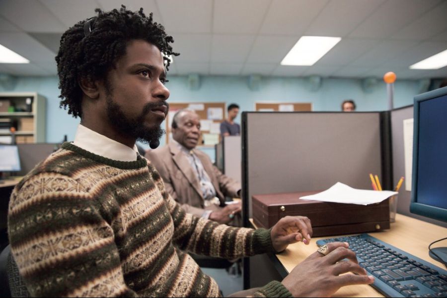 sorry-to-bother-you-2018-009-lakeith-stanfield-in-jumper-at-keyboard.jpg