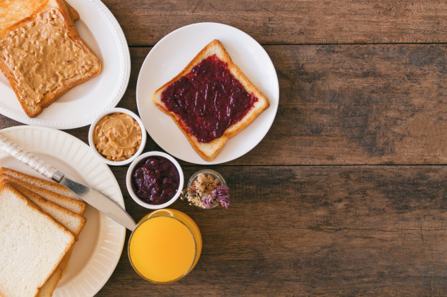 toast-bread-with-homemade-strawberry-jam-and-peanut-butter-served-with-orange-juice_54413-234.jpg