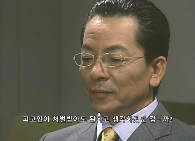 길 가던 무고한 시민을 붙잡아서 강도로 만든 형사_50.jpg