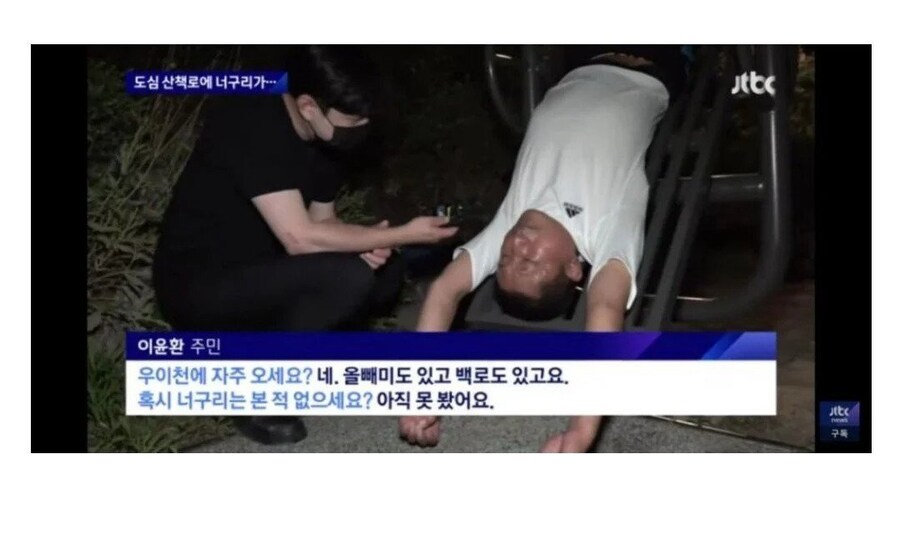 모진 고문받는 와중에도 너구리와의 우정을 지키는 아저씨.jpg_1.jpg