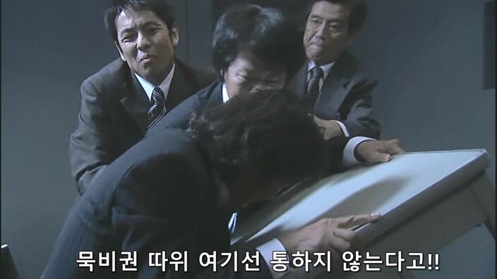 선량한 용의자를 취조하는 일본형사들_8.jpg