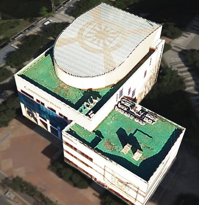 용산 통일교 건물 옥상에 욱일기 연상 문양…구청 "가려 달라"_1.jpg