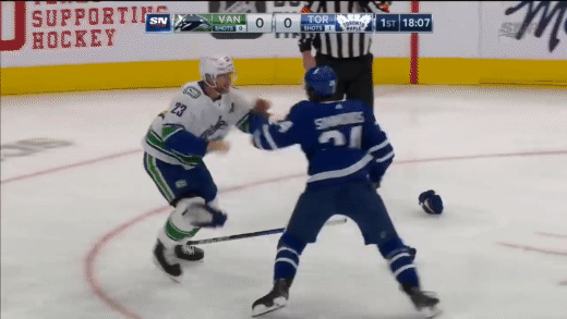 Alex_Edler_Answers_The_Bell_And_Fights_Wayne_Simmonds.gif