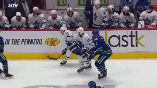 Alex_Edler_Gets_Major_And_Game_Misconduct_For_Kneeing_Zach_H.gif