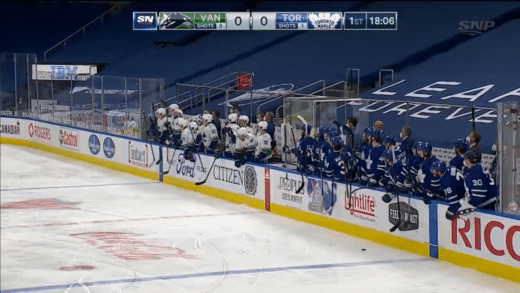 Alex_Edler_Answers_The_Bell_And_Fights_Wayne_Simmonds(1).gif